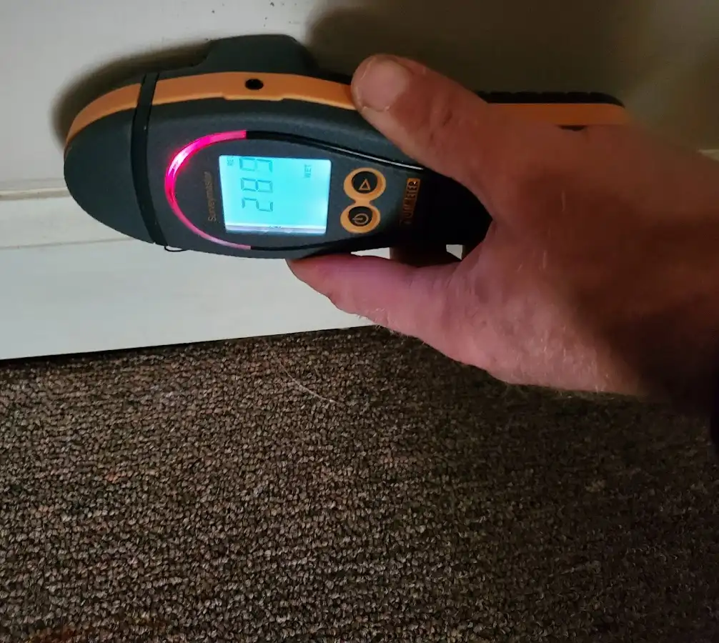 Moisture detection at baseboard during Storm Damage Restoration in Colusa